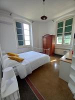 Łóżko lub łóżka w pokoju w obiekcie La Locanda di San Biagio