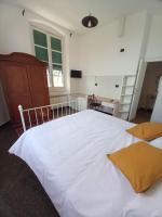 Łóżko lub łóżka w pokoju w obiekcie La Locanda di San Biagio