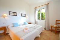 Postel nebo postele na pokoji v ubytování Villa Belinda by Sonne Villas
