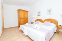 Postel nebo postele na pokoji v ubytování Villa Belinda by Sonne Villas