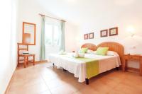 Postel nebo postele na pokoji v ubytování Villa Belinda by Sonne Villas