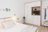 Postel nebo postele na pokoji v ubytování VILLA DANIELA Maslinica