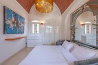 Postel nebo postele na pokoji v ubytování VESTA - El Gouna Residence