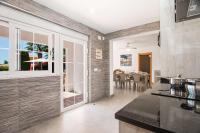 A kitchen or kitchenette at Villa Erik - PlusHolidays
