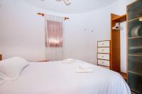 A bed or beds in a room at Villa Erik - PlusHolidays