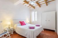 A bed or beds in a room at CA S'AVI BIEL