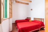 A bed or beds in a room at Camps 4 bedroom house, Ciutadella