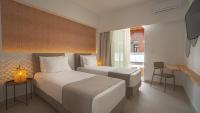 Posteľ alebo postele v izbe v ubytovaní Sfakia Seaside luxury Suites