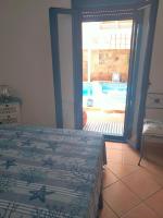 Posteľ alebo postele v izbe v ubytovaní Villa Rosa meravigliosa con piscina interna