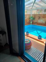 Bazén v ubytovaní Villa Rosa meravigliosa con piscina interna alebo v jeho blízkosti