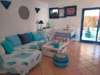 Posedenie v ubytovaní Villa Rosa meravigliosa con piscina interna
