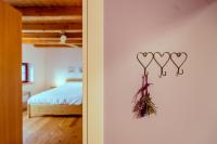 Posteľ alebo postele v izbe v ubytovaní Agriturismo Ronchi Rò