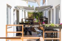 Reštaurácia alebo iné gastronomické zariadenie v ubytovaní Domki Aqua Holiday