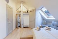 Posteľ alebo postele v izbe v ubytovaní Olymp apartment