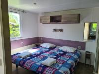Posteľ alebo postele v izbe v ubytovaní Resort & Camping - Val de Braye