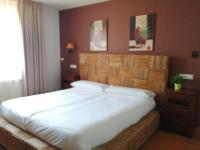 Postel nebo postele na pokoji v ubytování Apartamentos Rurales El Mirador de San Juan