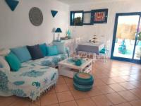 Posedenie v ubytovaní Villa Rosa meravigliosa con piscina interna