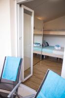 Postel nebo postele na pokoji v ubytování Penthouse Apartment LUX with a panoramic view, located on the beachfront of Ciovo-Trogir