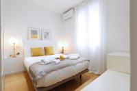 Postel nebo postele na pokoji v ubytování Chueca Jacuzzi