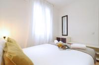 Postel nebo postele na pokoji v ubytování Chueca Jacuzzi