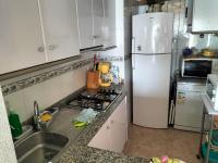 Kuchyň nebo kuchyňský kout v ubytování LOMAS DEL MAR TORREVIEJA SOBRE EL MEDITERRÁNEO