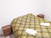 Posteľ alebo postele v izbe v ubytovaní Levico Al Corso Apartments