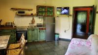 Kuchyň nebo kuchyňský kout v ubytování Guest House Fanny