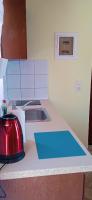 Kuchyňa alebo kuchynka v ubytovaní Anemos Guest House Karpathos