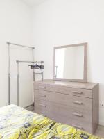 Posteľ alebo postele v izbe v ubytovaní Levico Al Corso Apartments