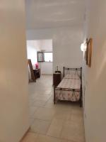 A bed or beds in a room at La Nuova Casetta