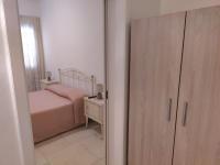 A bed or beds in a room at La Nuova Casetta