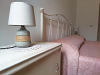 A bed or beds in a room at La Nuova Casetta