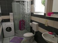 Kúpeľňa v ubytovaní APARTMANI BAN