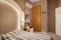 Postel nebo postele na pokoji v ubytování Morfeas Hotel