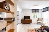 TV a/nebo společenská místnost v ubytování SV Acropolis Residence