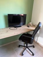 Telewizja i/lub zestaw kina domowego w obiekcie Casa Monroe op Oasis Tamarindo 1