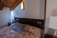 A bed or beds in a room at Apartamentos Top Medieval