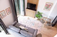 Televízia a/alebo spoločenská miestnosť v ubytovaní Tourist House Alfalfa