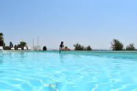 The swimming pool at or close to Le Ginestre Arte Vacanze