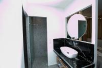 Kúpeľňa v ubytovaní Mythos Bungalows