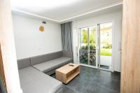 Posedenie v ubytovaní Mythos Bungalows