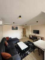 A television and/or entertainment centre at White House Apart