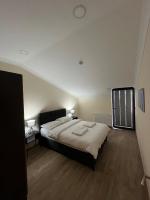 A bed or beds in a room at White House Apart