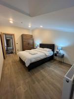 A bed or beds in a room at White House Apart