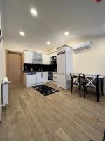 A kitchen or kitchenette at White House Apart