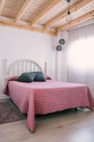 A bed or beds in a room at Casa Beta Ven A Disfrutarla