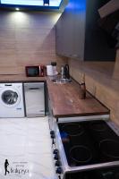 Kuchy&#x148;a alebo kuchynka v ubytovan&iacute; Wellness Apartment Kalypso