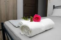 A bed or beds in a room at Villa Giannis 2
