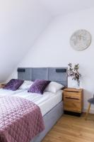 Postel nebo postele na pokoji v ubytování Apartamenty Krupówki 48B