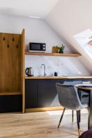 Kuchyň nebo kuchyňský kout v ubytování Apartamenty Krupówki 48B